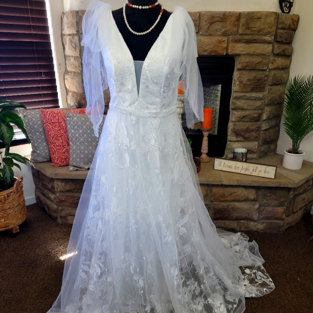 Brand new Size Large white wedding dress